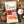 Load image into Gallery viewer, A bag of EPIC Hot and Spicy Pork Rinds around the ingredients that go in the product.
